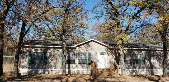 a view of residential houses with city view