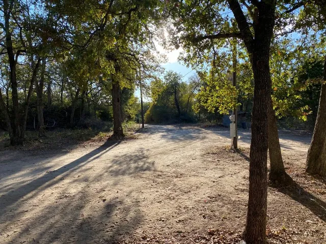 a view of backyard with green space