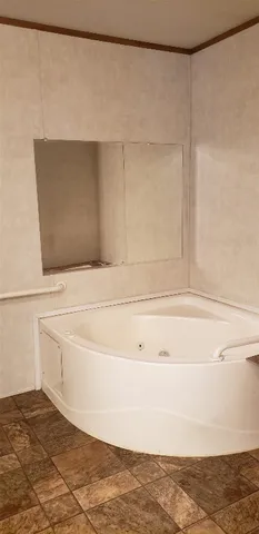 a bathroom with a bathtub
