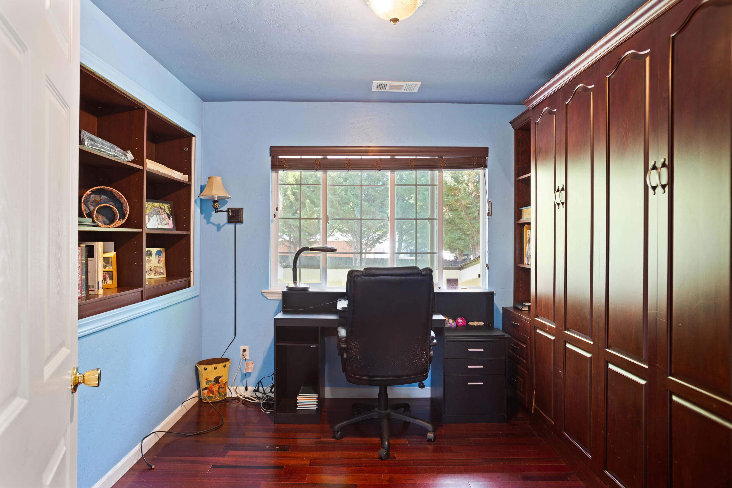 255 Queens Branch Road Rogue River, OR 97537 - Photo 24 of 60 a view of a workspace with furniture and a window