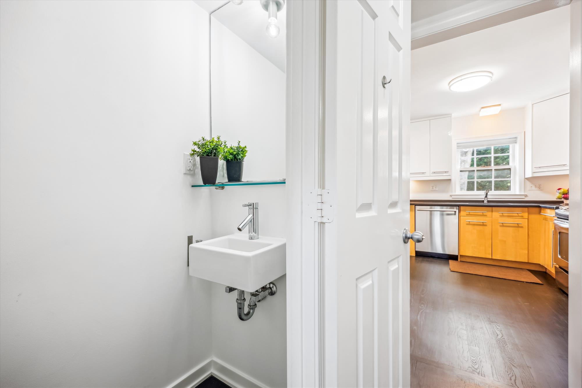 6705 Hillandale Road Chevy Chase, MD 20815 - Photo 11 of 33 Modern half bath on Main Level