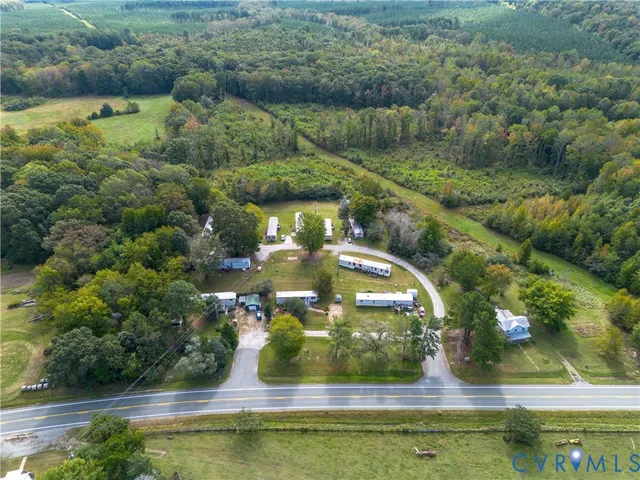 a view of swimming pool with a yard