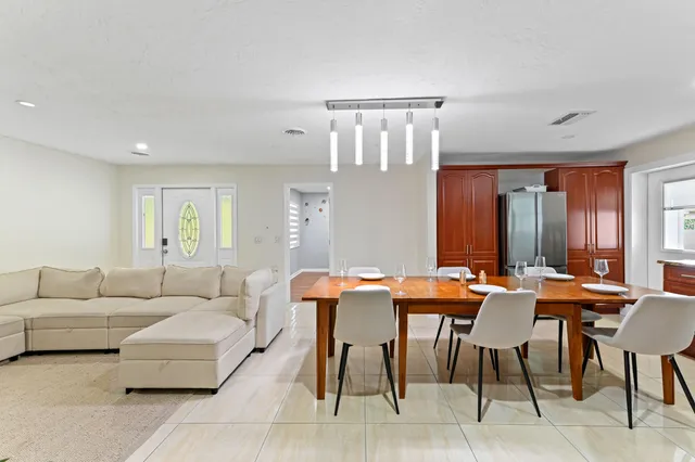 a room with a bed and furniture