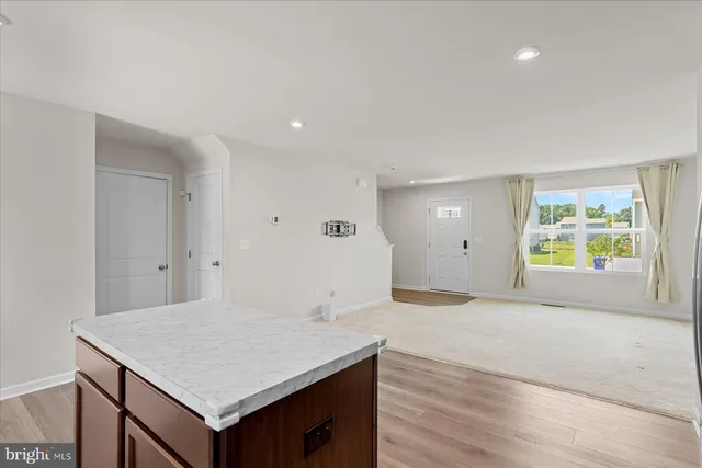 a view of kitchen and a window