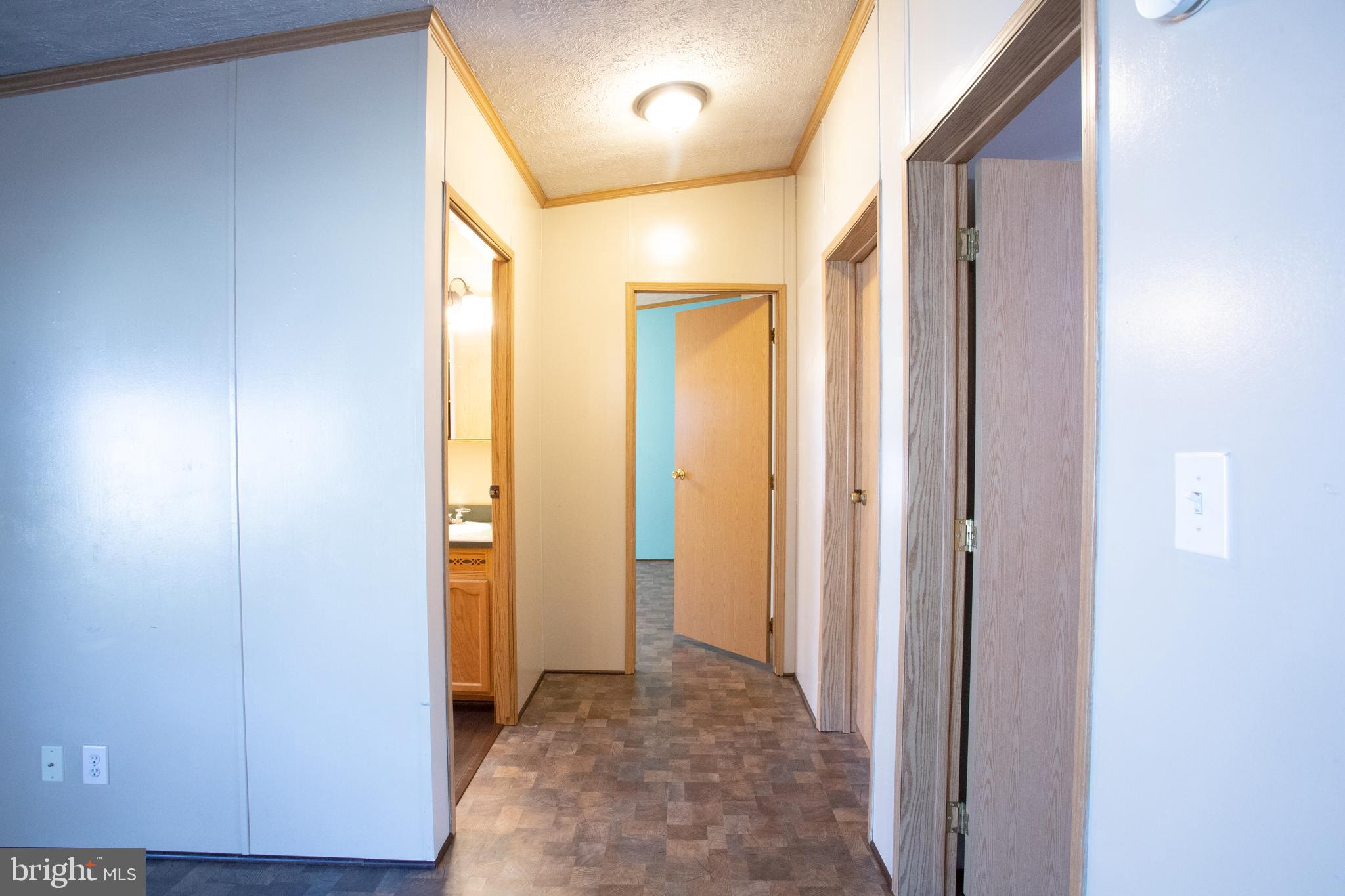 7959 Telegraph Road, Unit 150 Severn, MD 21144 - Photo 12 of 35 Hallway to 3 bedrooms and full bath