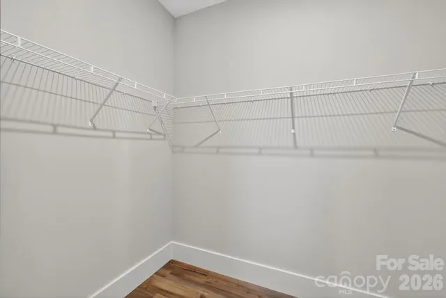 a view of a room with racks on the wall