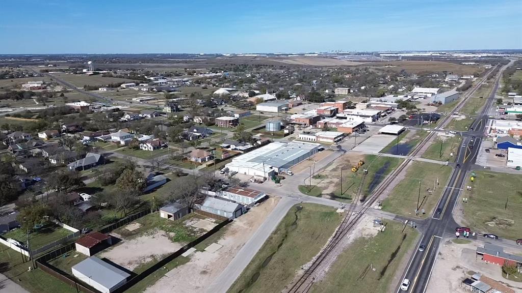 Lot 4 South R S Main Street Ferris, TX 75125 - Photo 1 of 10 an aerial view of a city with ocean view