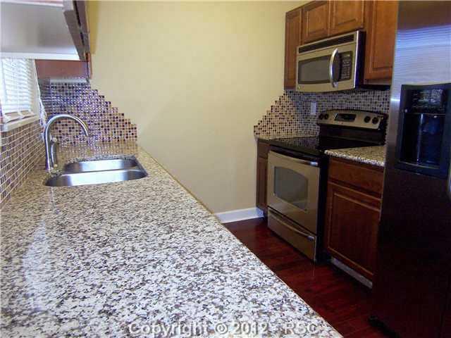 7212 River Bend Road Colorado Springs, CO 80911 - Photo 6 of 22 Beautifully Updated Kitchen