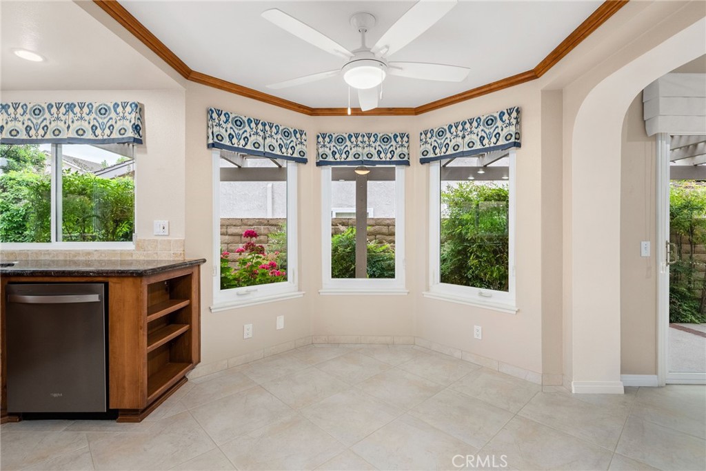198 Sunflower Street Brea, CA 92821 - Photo 17 of 43 a view of an empty room with a window and a kitchen