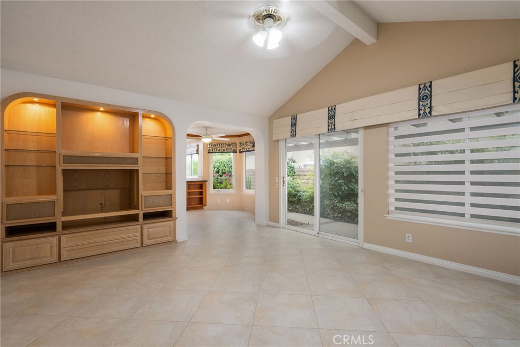 198 Sunflower Street Brea, CA 92821 - Photo 19 of 43 a view of an empty room with a fireplace and a large window