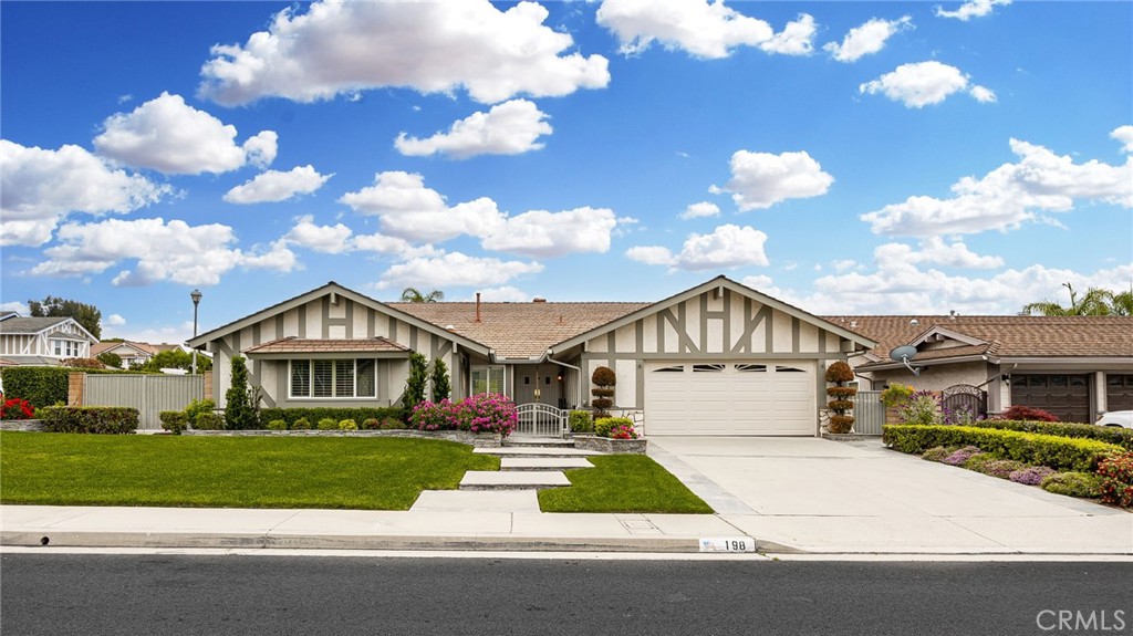 198 Sunflower Street Brea, CA 92821 - Photo 2 of 43 a front view of a house with a yard