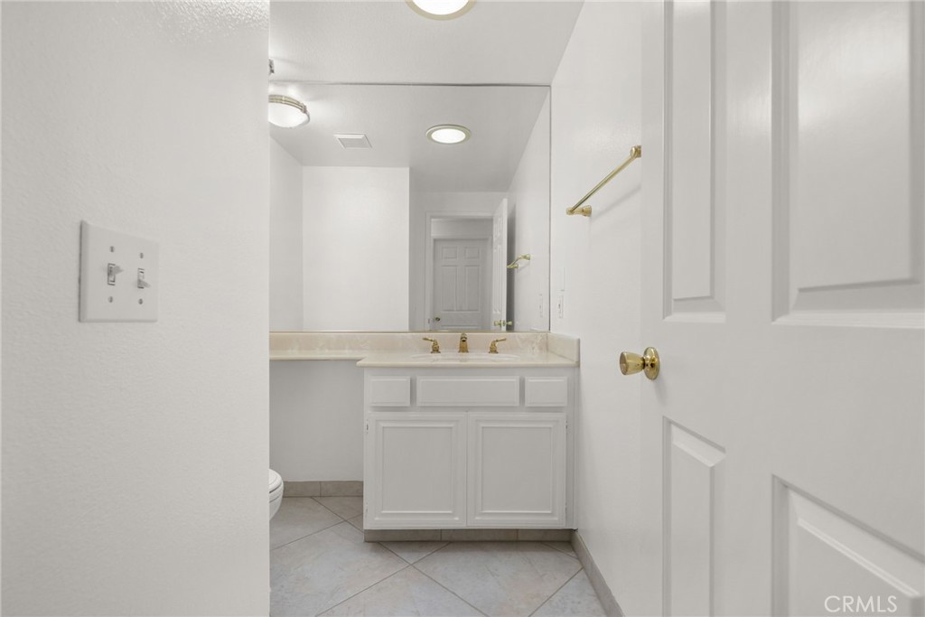 198 Sunflower Street Brea, CA 92821 - Photo 21 of 43 a bathroom with a sink and a mirror