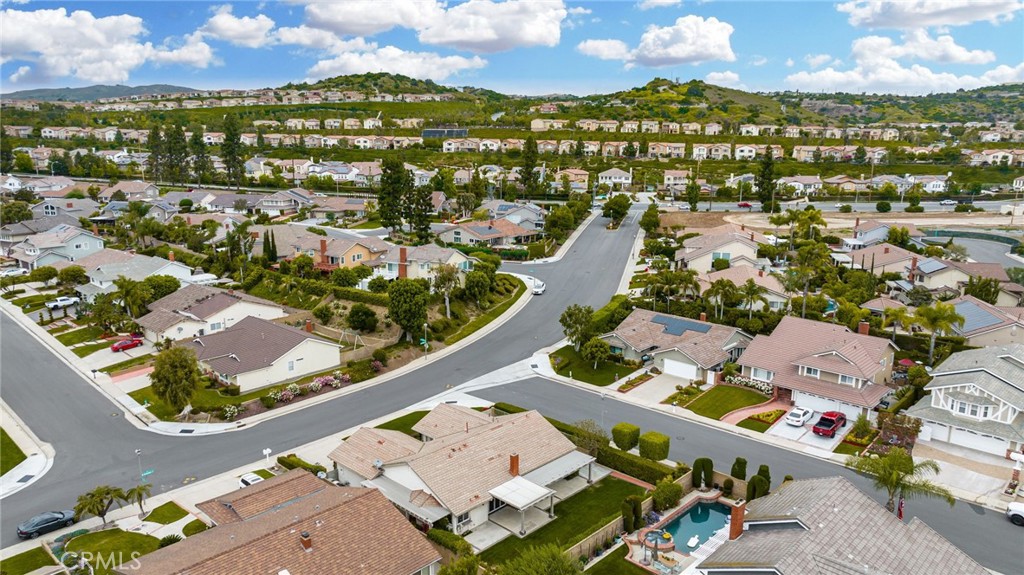 198 Sunflower Street Brea, CA 92821 - Photo 38 of 43 an aerial view of a city with lots of residential buildings ocean and mountain view in back