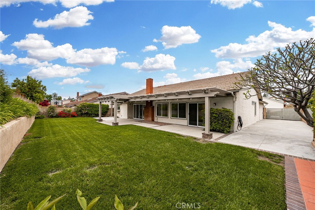 198 Sunflower Street Brea, CA 92821 - Photo 6 of 43 a front view of a house with a garden