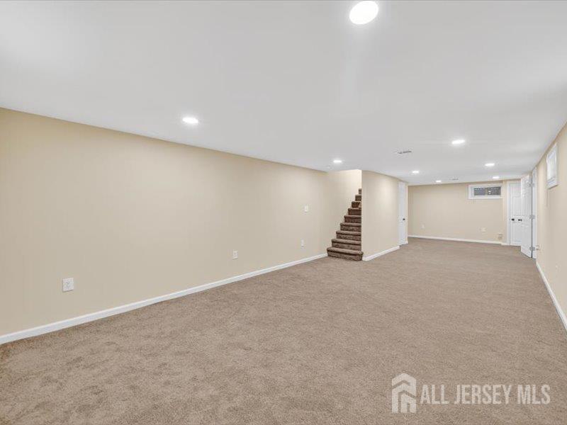 54 Freeman Street Woodbridge, NJ 07095 - Photo 21 of 35 a view of an empty room with a window