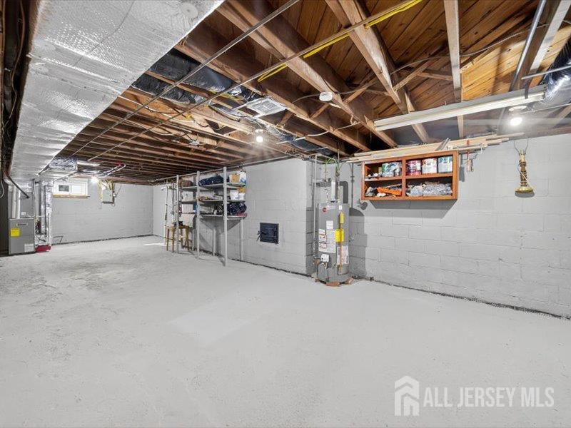 54 Freeman Street Woodbridge, NJ 07095 - Photo 22 of 35 a view of empty room with wooden ceiling