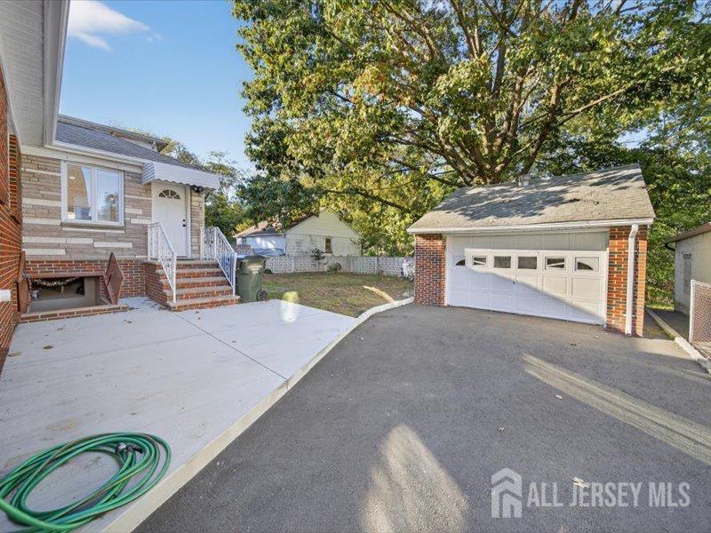 54 Freeman Street Woodbridge, NJ 07095 - Photo 7 of 35 a view of a back yard of the house