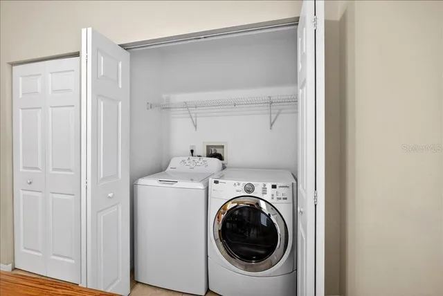 a utility room with dryer and washer