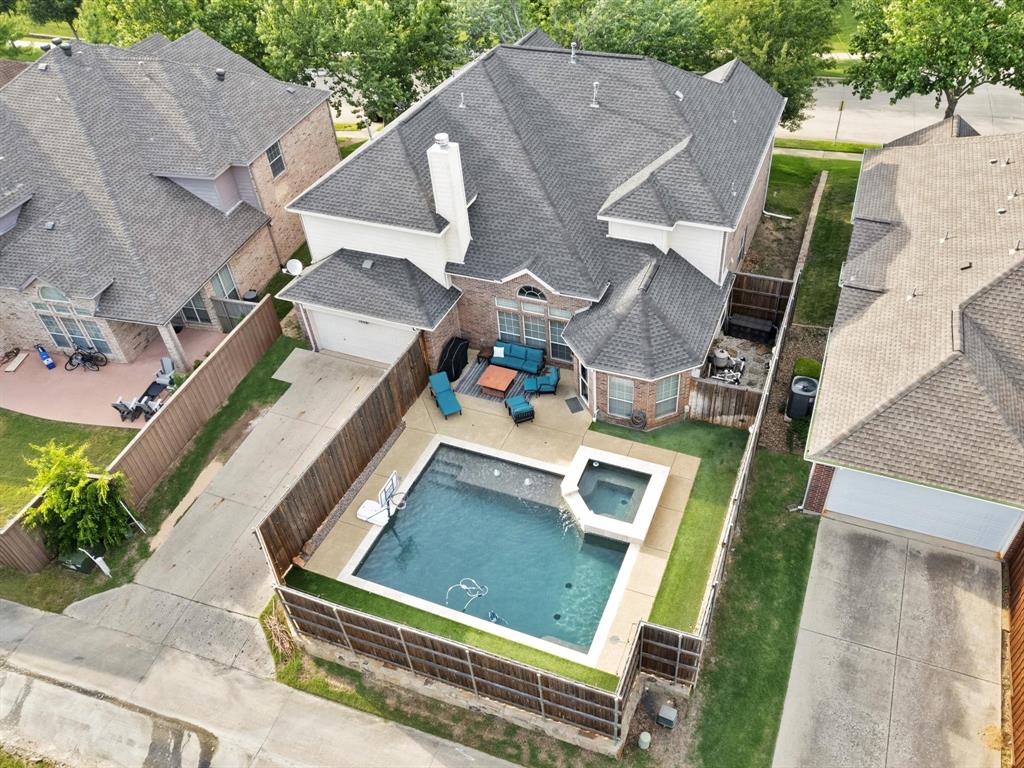 1803 Timber Ridge Drive Frisco, TX 75036 - Photo 34 of 40 View of subject property with a pool area