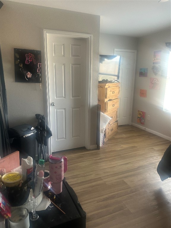 23269 High Point Street, Unit 71 Prairie View, TX 77445 - Photo 11 of 31 a living room with furniture and a wooden floor