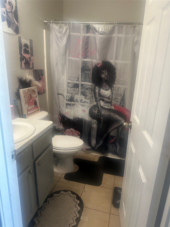 23269 High Point Street, Unit 71 Prairie View, TX 77445 - Photo 13 of 31 a bathroom with a toilet and a shower