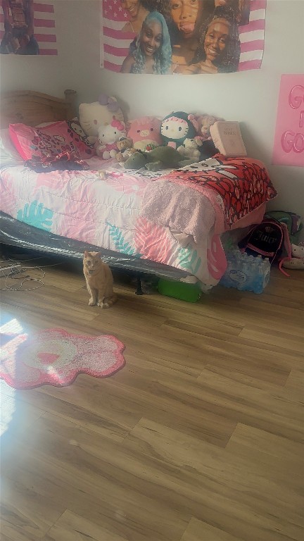 23269 High Point Street, Unit 71 Prairie View, TX 77445 - Photo 14 of 31 a bedroom with a bed and a couch