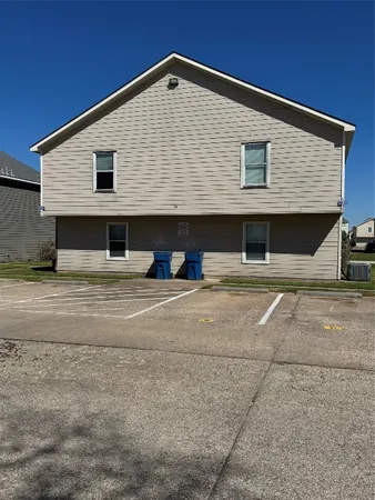 a front view of a house with a garage