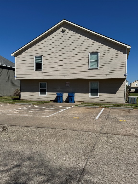 23269 High Point Street, Unit 71 Prairie View, TX 77445 - Photo 2 of 31 a front view of a house with a garage