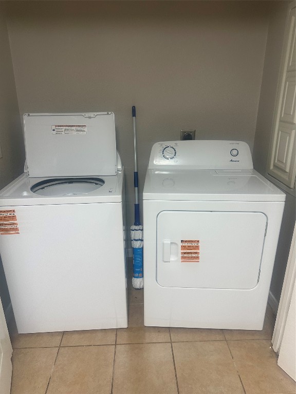 23269 High Point Street, Unit 71 Prairie View, TX 77445 - Photo 27 of 31 a utility room with dryer and washer