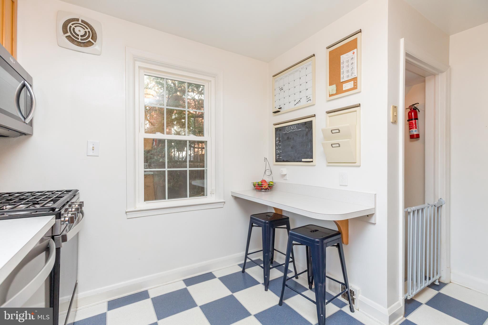 6679 Loch Hill Road Baltimore, MD 21239 - Photo 12 of 37 Eat-In Kitchen w/Breakfast Bar