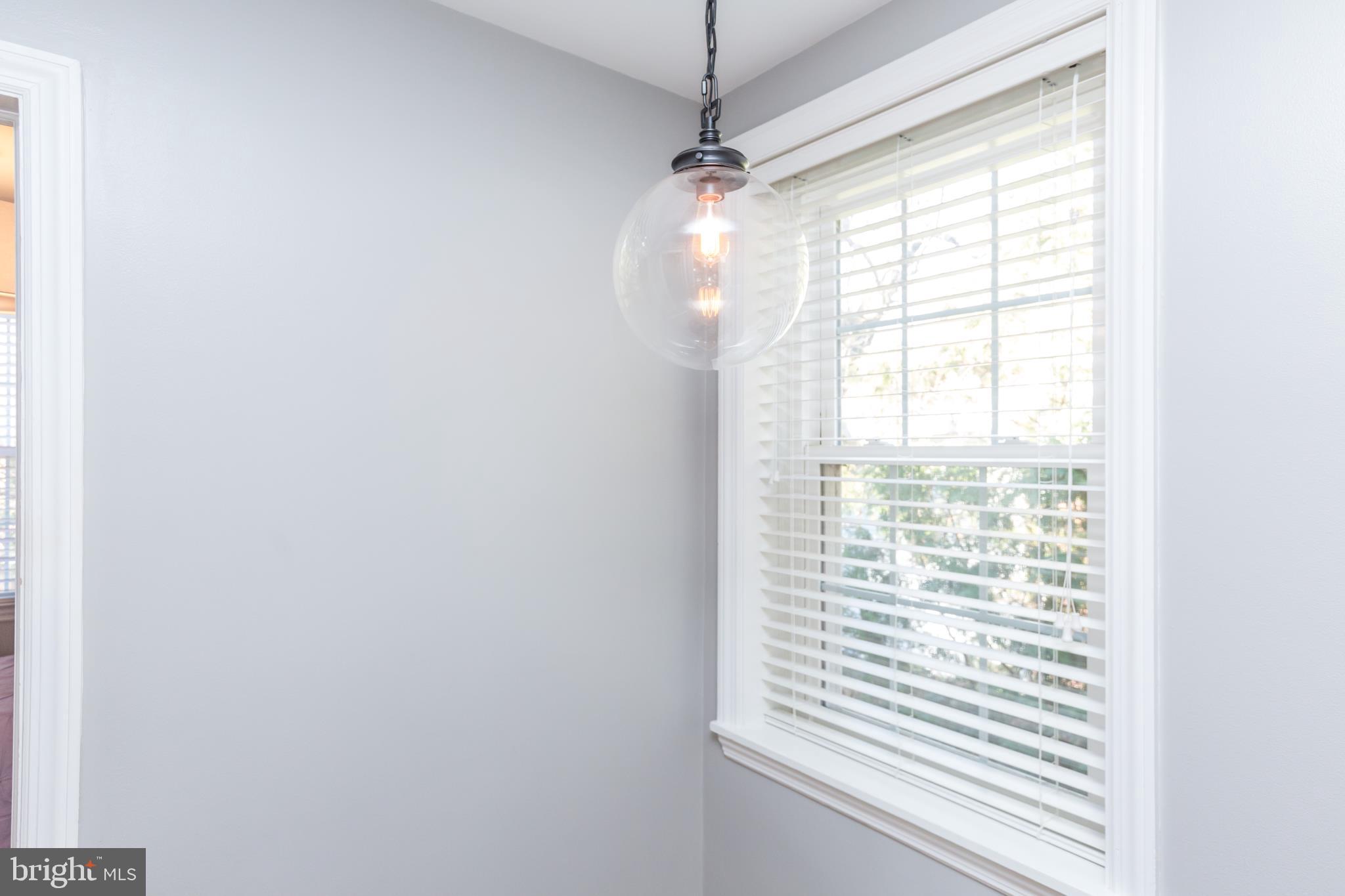 6679 Loch Hill Road Baltimore, MD 21239 - Photo 25 of 37 Hallway-light fixture