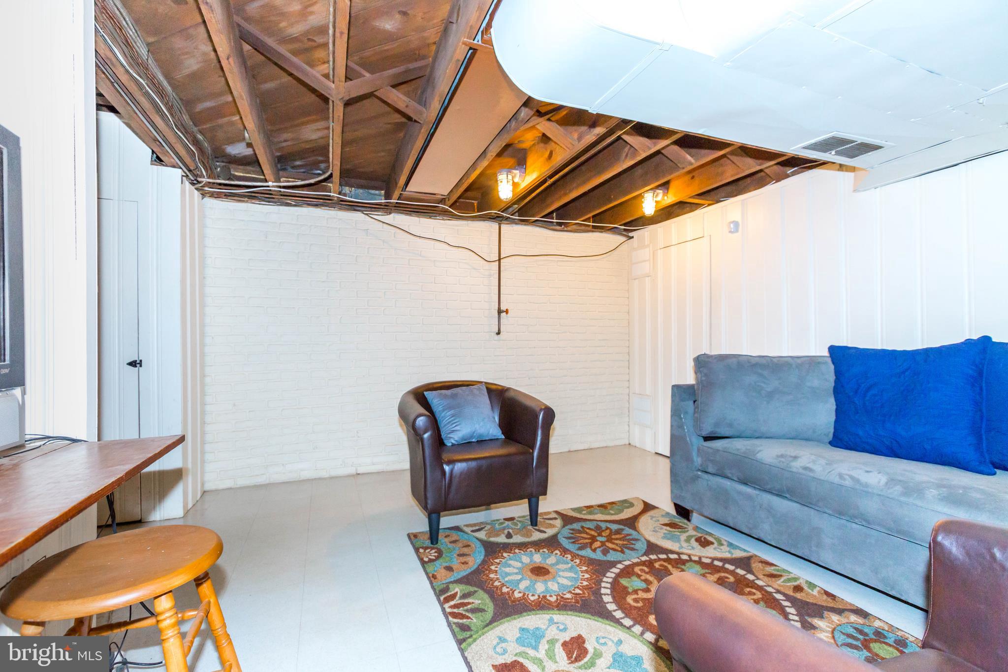 6679 Loch Hill Road Baltimore, MD 21239 - Photo 29 of 37 Finished Lower Level /Rec Room Area