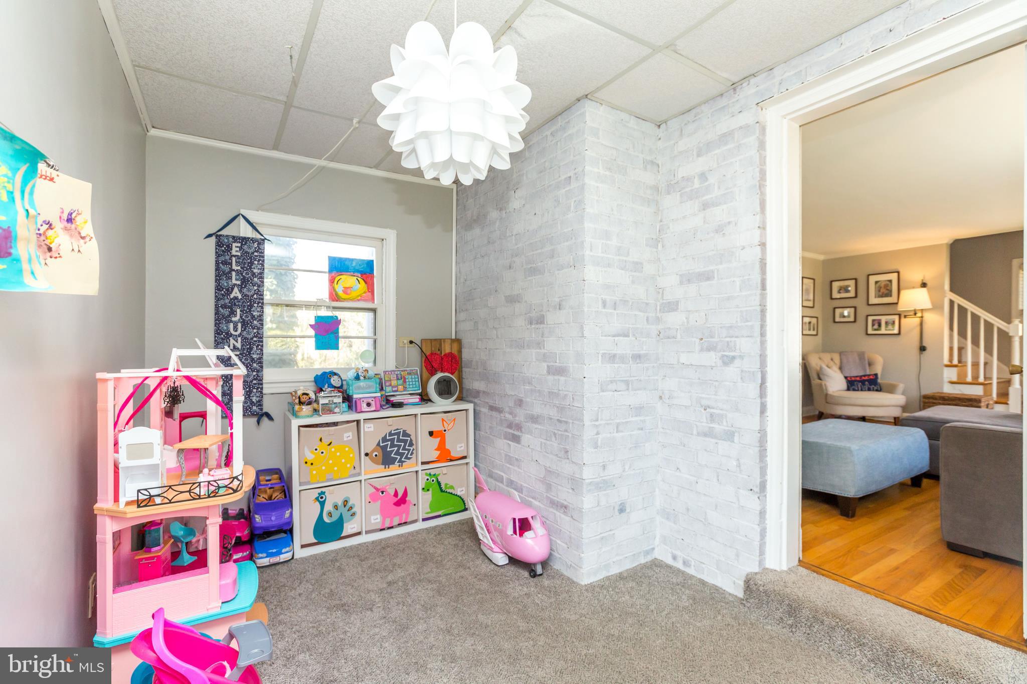 6679 Loch Hill Road Baltimore, MD 21239 - Photo 32 of 37 Sunporch Addition/playroom