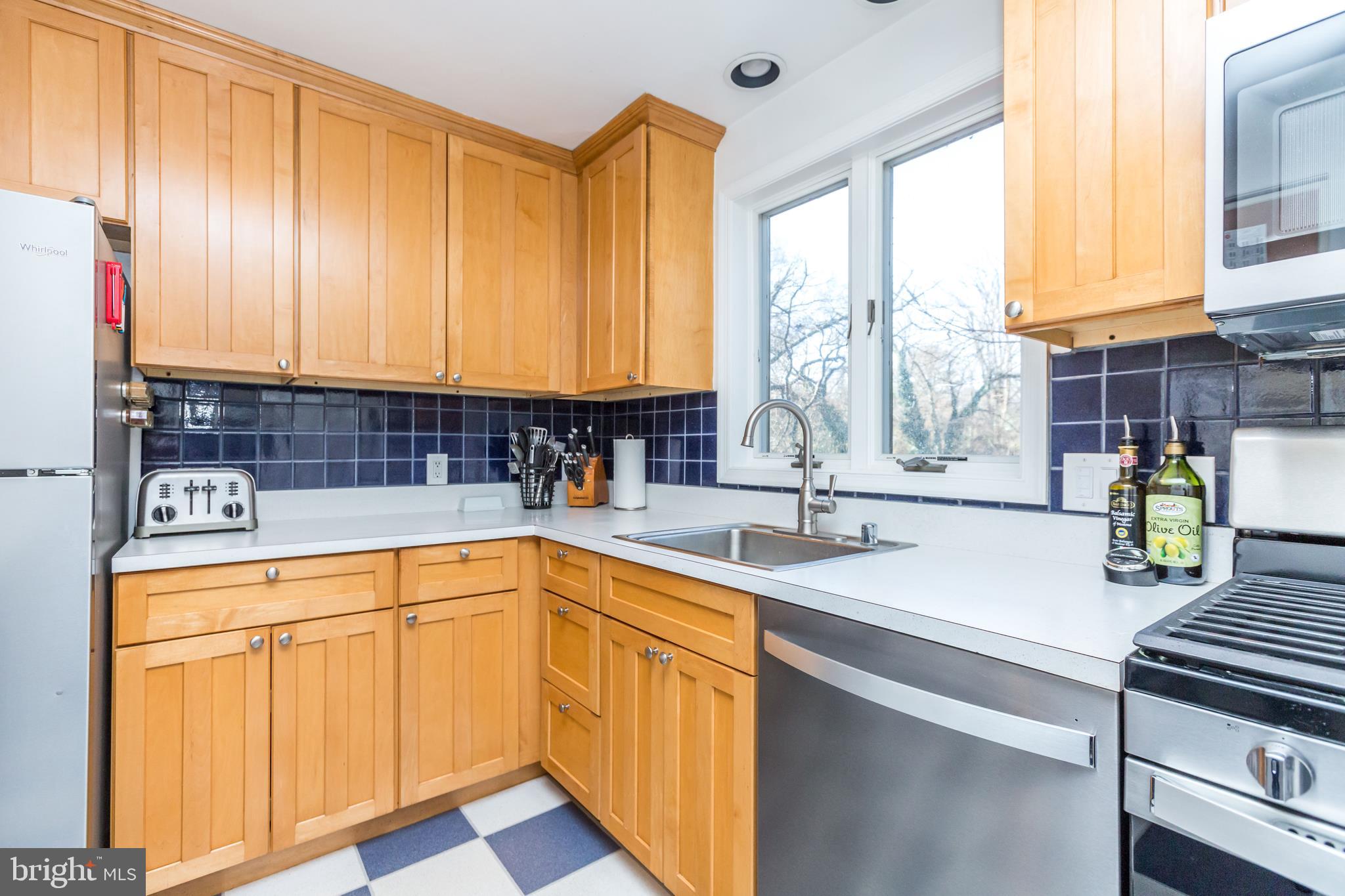 6679 Loch Hill Road Baltimore, MD 21239 - Photo 10 of 37 Kitchen w/Maple Cabinetry