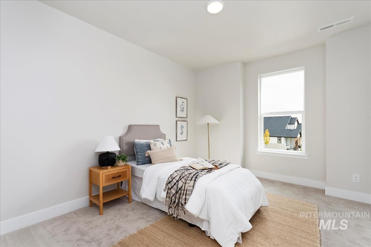 2702 West Gidran Meridian, ID 83642 - Photo 27 of 30 Carpeted bedroom with baseboards