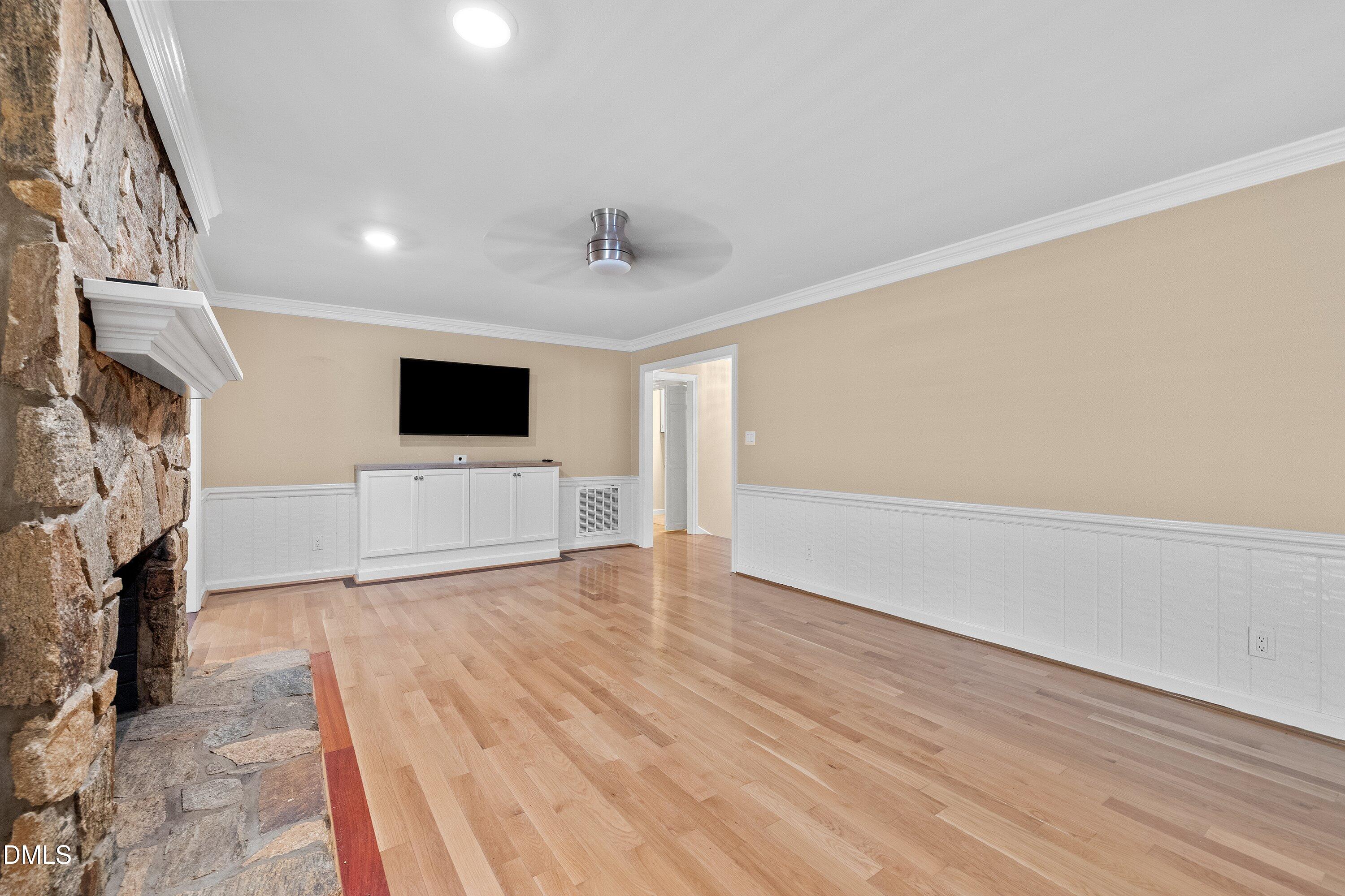 8133 Holly Forest Road Wake Forest, NC 27587 - Photo 7 of 50 a view of a livingroom with a fireplace