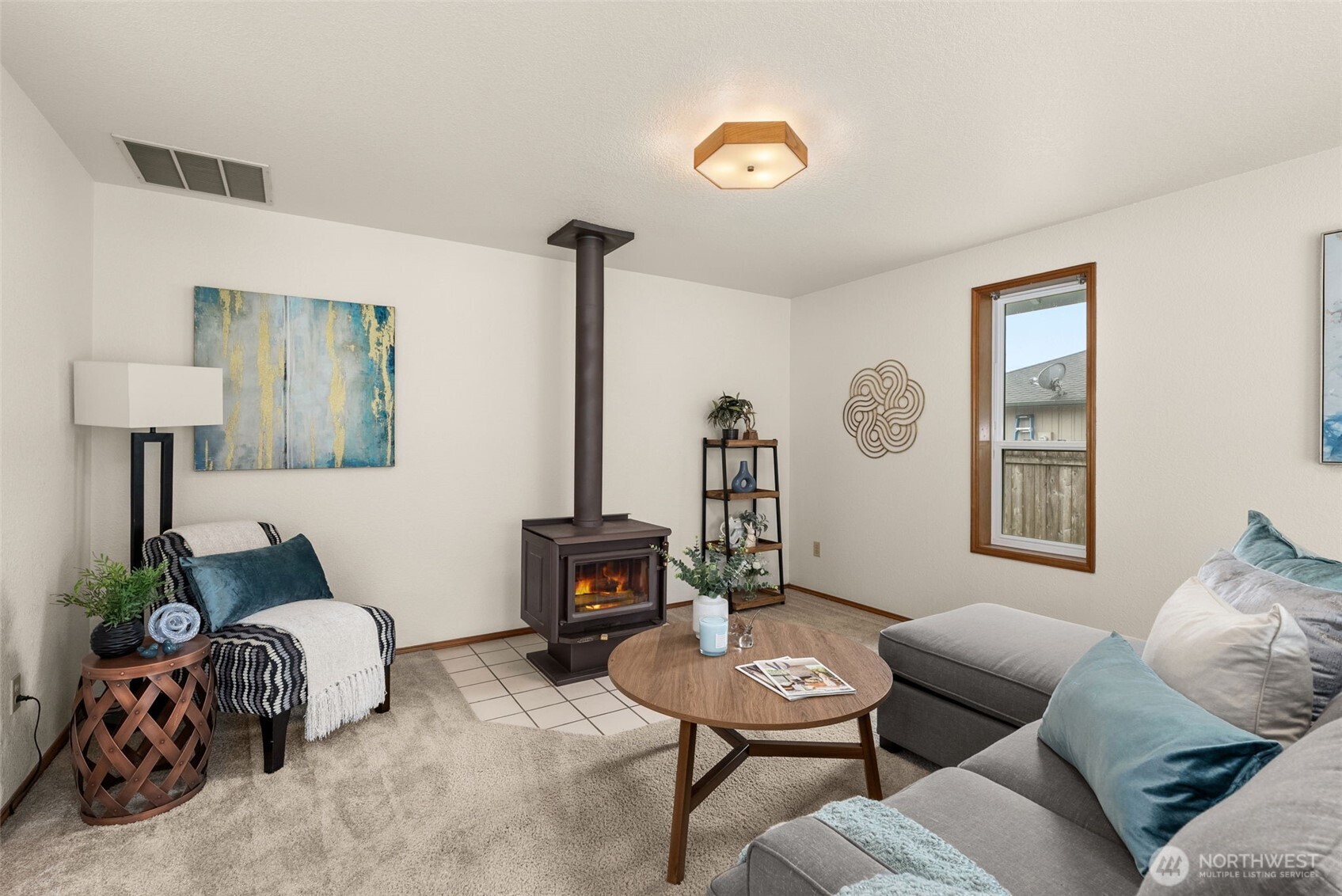 3724 Golden Eagle Loop Southeast Olympia, WA 98513 - Photo 16 of 40 a living room with furniture and a window