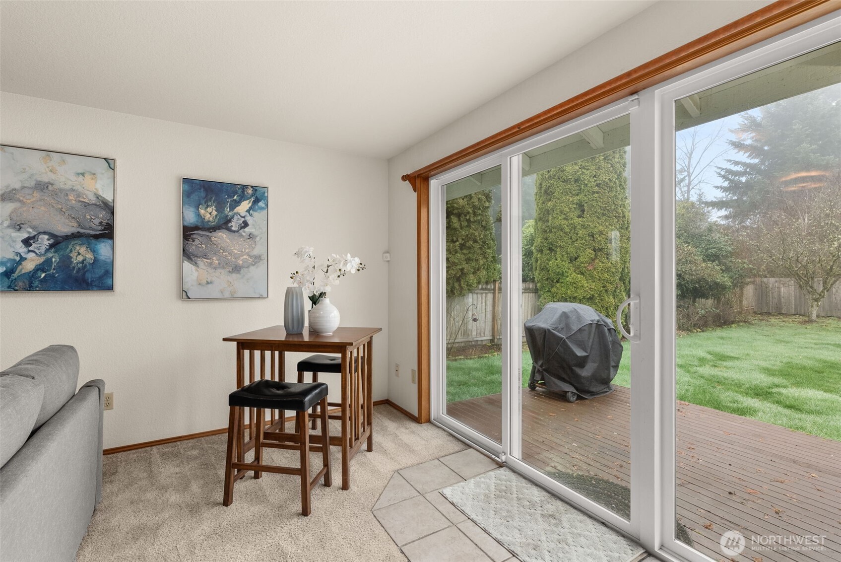 3724 Golden Eagle Loop Southeast Olympia, WA 98513 - Photo 18 of 40 a dining room with furniture and a floor to ceiling window