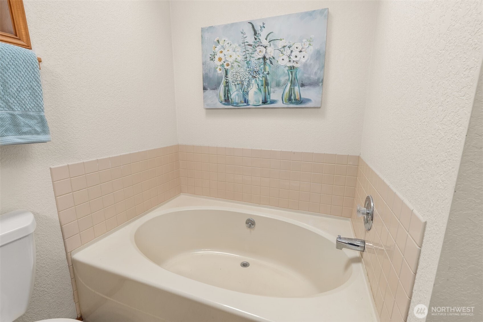 3724 Golden Eagle Loop Southeast Olympia, WA 98513 - Photo 28 of 40 a white bath tub sitting next to a white toilet