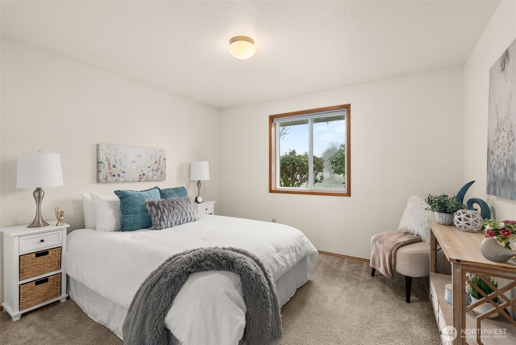 3724 Golden Eagle Loop Southeast Olympia, WA 98513 - Photo 29 of 40 a bedroom with a bed and a window