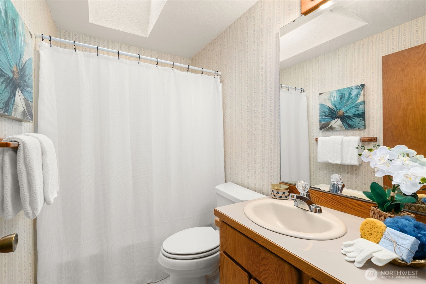 3724 Golden Eagle Loop Southeast Olympia, WA 98513 - Photo 31 of 40 a bathroom with a sink toilet and shower