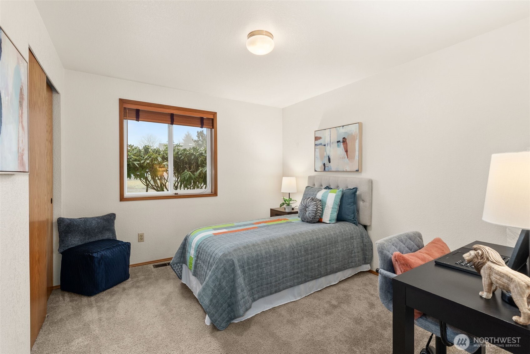 3724 Golden Eagle Loop Southeast Olympia, WA 98513 - Photo 32 of 40 a bedroom with a bed and a window