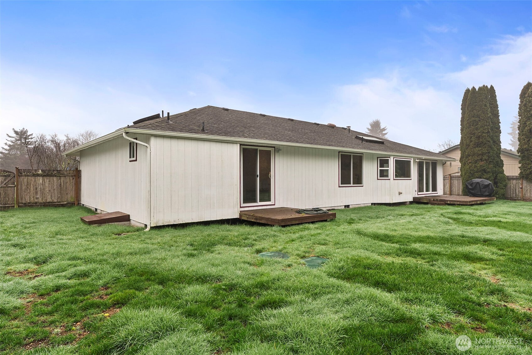 3724 Golden Eagle Loop Southeast Olympia, WA 98513 - Photo 35 of 40 a backyard of a house with lots of green space