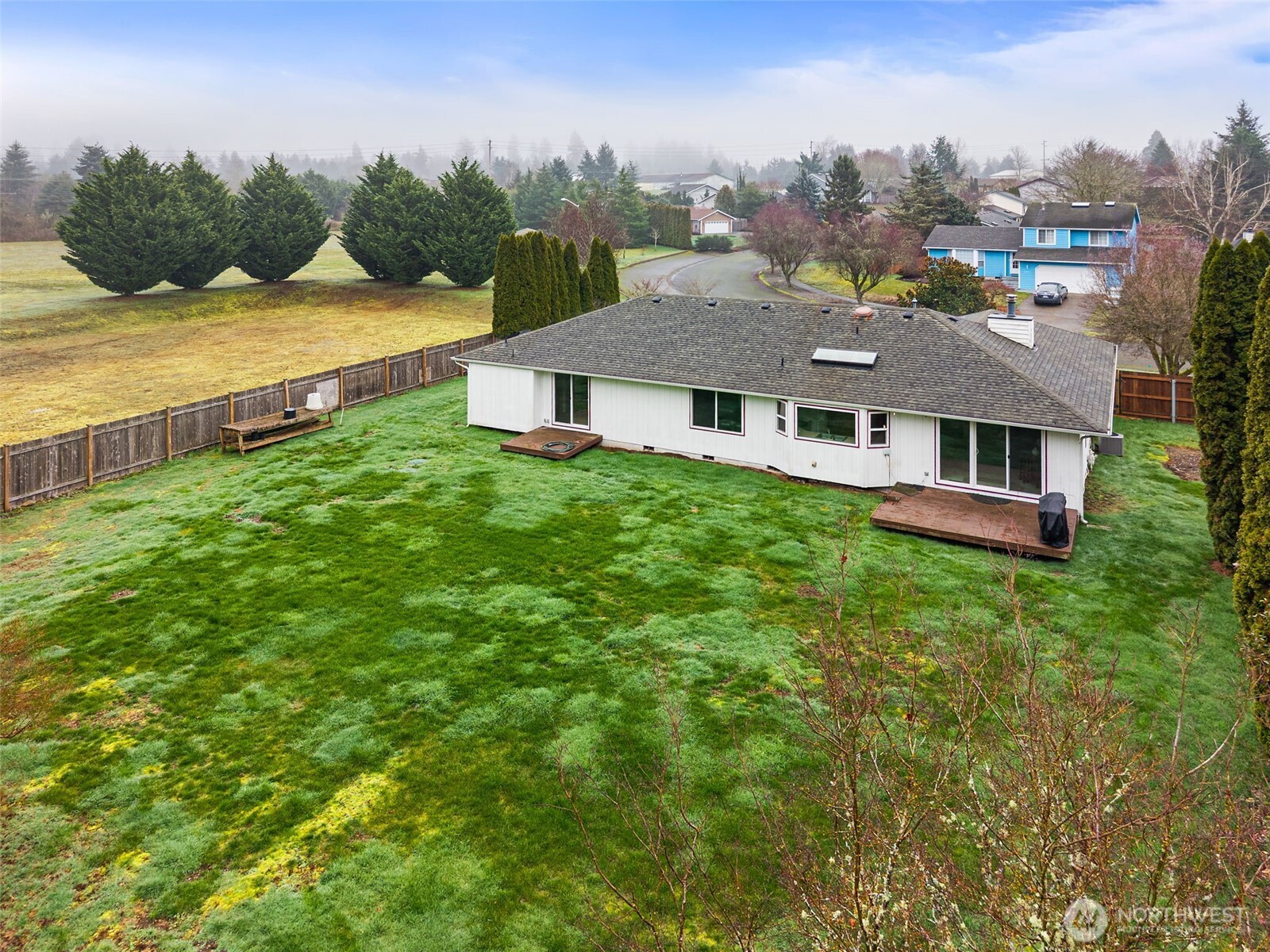 3724 Golden Eagle Loop Southeast Olympia, WA 98513 - Photo 40 of 40 a aerial view of a house with swimming pool and a yard