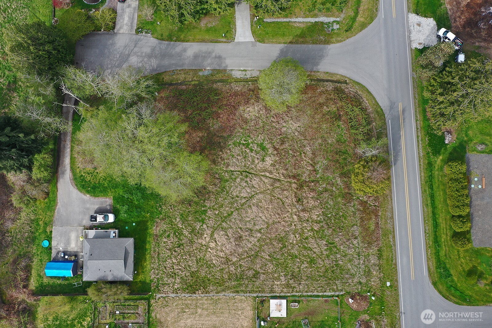 85 Skyview Drive Clinton, WA 98236 - Photo 20 of 26 an aerial view of residential house with outdoor space and trees all around