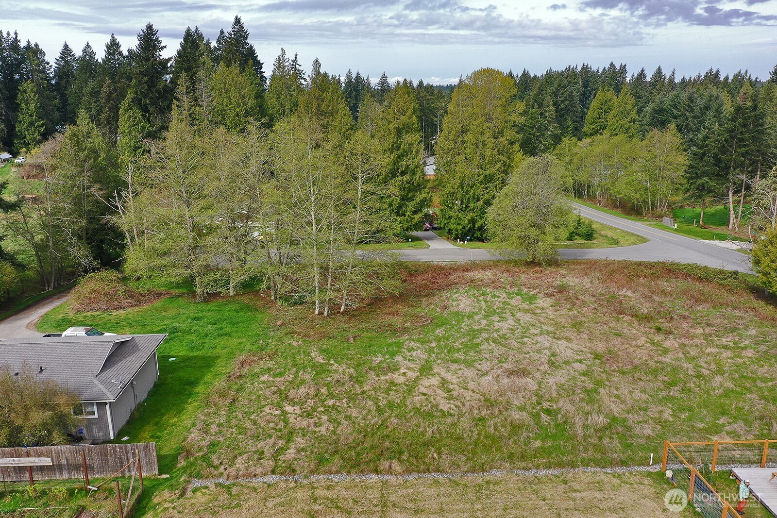 85 Skyview Drive Clinton, WA 98236 - Photo 3 of 26 a view of a lake with a yard