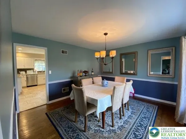 a view of a dining room with furniture