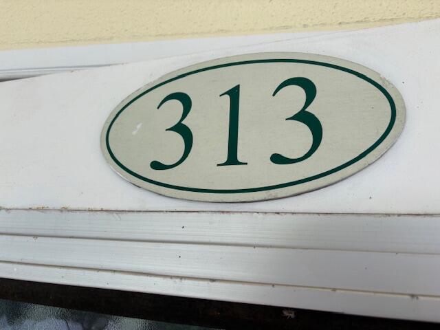 313 Dorset H, Unit 313 Boca Raton, FL 33434 - Photo 20 of 20 a bathroom with a sink and a mirror