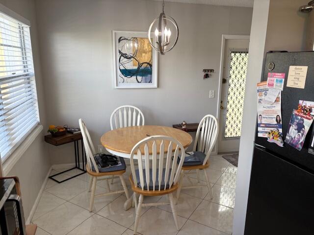 313 Dorset H, Unit 313 Boca Raton, FL 33434 - Photo 5 of 20 a view of a dining room with furniture
