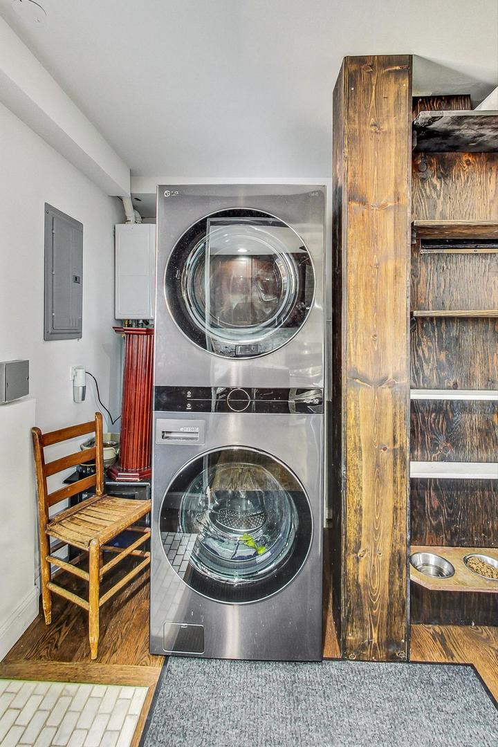 1738 Morse Avenue Des Plaines, IL 60018 - Photo 20 of 31 a living room with furniture and a wooden floor